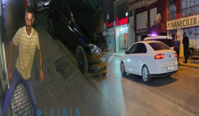 İş yerinin camını tekmeyle kıran şüpheliyi esnaf yakaladı!